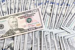 US Dollar bills. one hundred dollar bills background. Top view of business concept on background with copy space photo