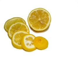 Sliced citrus fruit. Lemon on the table. sour photo