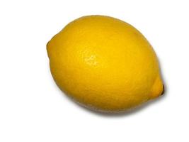 A whole lemon  on a white background. Citrus on the table.  lemon isolate photo