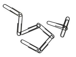 Large paper clips on a white background. Office supplies isolate. Paper clips photo