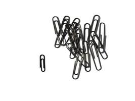 Large paper clips on a white background. Office supplies isolate.  Paper clips. Goods for business photo