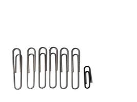 Large paper clips on a white background. Office supplies isolate. Paper fastening. Paper clips. photo