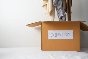 Concept of donation old or second hand clothes photo