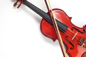 Close up of Violin Against on white background with copy space. Instrument and musical concept. photo