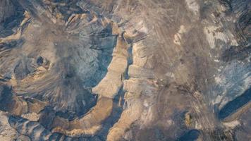 Lots of sandstone hills on the grounds of the cement factory before being transported as raw materials. photo