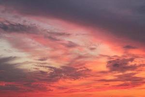 Colorful cloudy twilight beautiful sky cityscape sunset and morning sunrise. Dramatic evening night early morning view with city buildings silhouette. Panoramic background concept. Copy space for text photo