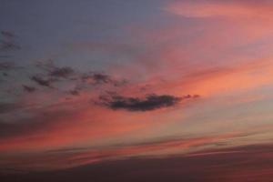 Colorful cloudy twilight beautiful sky cityscape sunset and morning sunrise. Dramatic evening night early morning view with city buildings silhouette. Panoramic background concept. Copy space for text photo