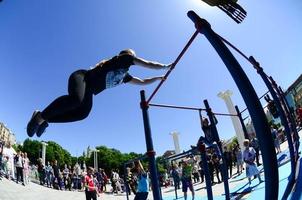 KHARKIV, UKRAINE - 27 MAY, 2022 Street workout show during the annual festival of street cultures photo