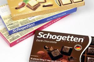 KHARKOV, UKRAINE - MAY 5, 2022 Schogetten chocolate packs. Chocolate produced by Ludwig Schokolade GmbH and Co. KG, one of Europe's most successful confectionery suppliers photo