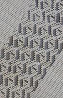 A pattern made of white bricks in the form of diamond shapes. Decoration of the walls during the Soviet Union photo