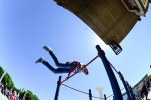 KHARKIV, UKRAINE - 27 MAY, 2022 Street workout show during the annual festival of street cultures photo