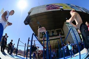 KHARKIV, UKRAINE - 27 MAY, 2022 Street workout show during the annual festival of street cultures photo