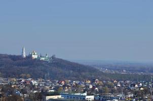 POLTAVA. UKRAINE - MAY 4, 2022 The Holy Cross Exaltation Monastery over the Poltava city photo