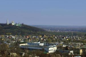 POLTAVA. UKRAINE - MAY 4, 2022 The Holy Cross Exaltation Monastery over the Poltava city photo