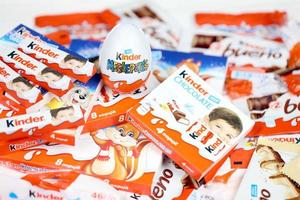 KHARKOV, UKRAINE - MAY 5, 2022 Kinder Chocolate various production. Kinder is a confectionery product brand line of multinational confectionery Ferrero. photo