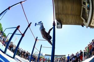 KHARKIV, UKRAINE - 27 MAY, 2022 Street workout show during the annual festival of street cultures photo