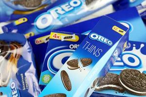 KHARKOV, UKRAINE - MAY 5, 2022 Oreo original and thins crispy cookies packs. The brand Oreo is owned by company Mondelez international photo