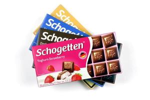 KHARKOV, UKRAINE - MAY 12, 2022 Schogetten chocolate packs. Chocolate produced by Ludwig Schokolade GmbH and Co. KG, one of Europe's most successful confectionery suppliers photo