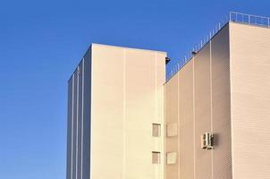 Siding on industrial high-rise building photo