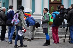 KHARKOV, UKRAINE - MAY 17, 2022 The beginning of the first LGBT action in Kharkov, which was interrupted by urban groups of Nazis, ultras and patriots photo