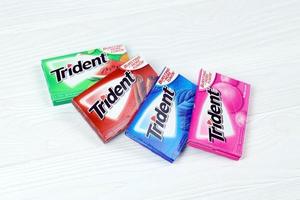 KHARKOV, UKRAINE - MAY 5, 2022 Packs of Trident gums. Trident was introduced in 1964 as one of the first patented sugarless gums photo