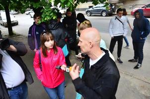 KHARKOV. UKRAINE - MAY 17, 2022 Participants of the right-wing Nazi and patriotic movement give interviews on the forced cessation of the first LGBT action in Kharkov