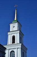 POLTAVA, UKRAINE - APRIL 27, 2022 The bell tower of the Holy Dormition Cathedral in poltava. Assum photo