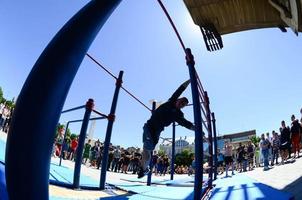 KHARKIV, UKRAINE - 27 MAY, 2022 Street workout show during the annual festival of street cultures photo