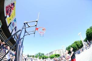 KHARKIV, UKRAINE - 27 MAY, 2022 Sports teams play streetball in the open air during the annual festival of street cultures photo