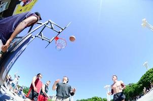 KHARKIV, UKRAINE - 27 MAY, 2022 Sports teams play streetball in the open air during the annual festival of street cultures photo