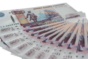 a lot of 500 banknotes of Bank of Russia on white background Russian rubles spine of five hundred rubles photo