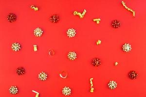 Christmas golden pattern on red background photo