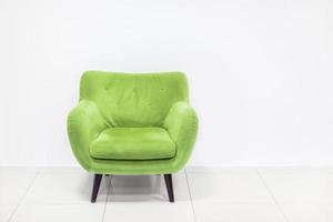 Minimal concept of interior with green armchair photo