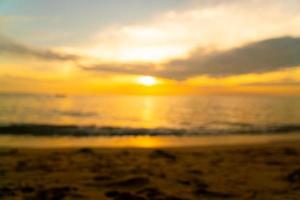 abstract blur beautiful tropical beach and sea with twilight sky at sunset times photo