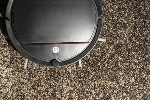 Robot Vacuum Cleaner Cleans the Carpet, Intelligent Robotic Equipment, Home Assistant photo