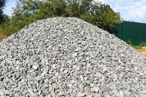 A pile of rubble on a construction site, gray stones photo