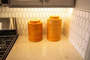 Two Ceramic Containers On Kitchen Counter photo
