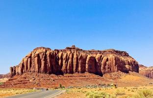 Unique Mountain Overlooking Small Down In Monument Valley, Utah photo