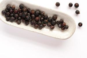 Dried Juniper Berries in a Bowl photo