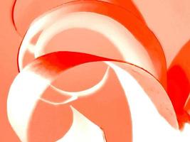 vibrant colourful red paper spiral ribbon high quality image or photograph photo