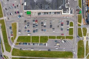 aerial view on large open air parking lot for cars for residents of area photo