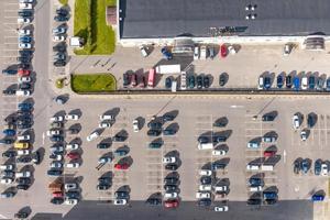 aerial view on large open air parking lot for cars for residents of area photo
