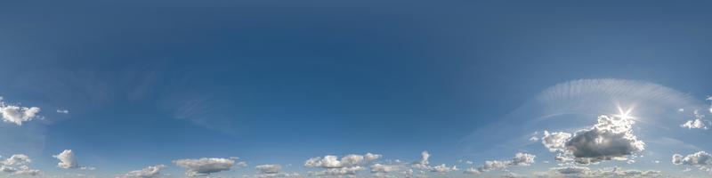 blue sky with beautiful clouds as seamless hdri 360 panorama view with zenith for use in 3d graphics or game development as sky dome or edit drone shot photo