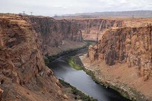 Aerial View Of Colorado River Flowing At Glen Canyon Dam photo