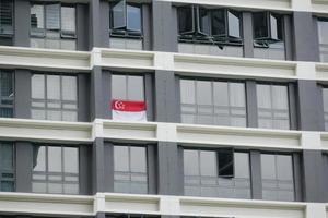 Singapore flags for celebration national day on buildings photo