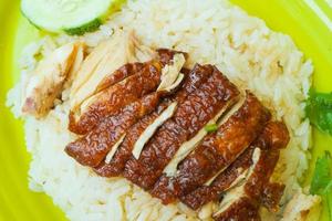 singapore chicken meat and rice on a plate photo
