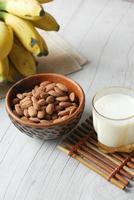 almond nut and milk on table photo