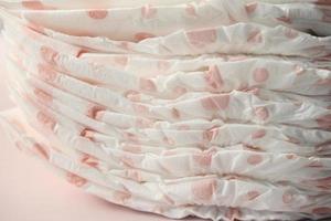 stack of baby diaper on table, photo