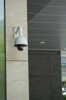 CCTV security camera operating outdoor photo