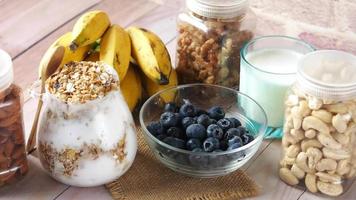 Nut jars, overnight oats, blueberries, bananas and a glass of milk video